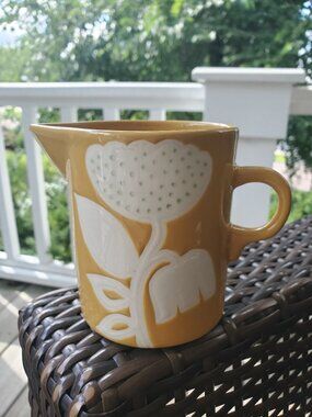 Kenzie Kae (Olika) mustard yellow pitcher with off white flower (4 in tall)
